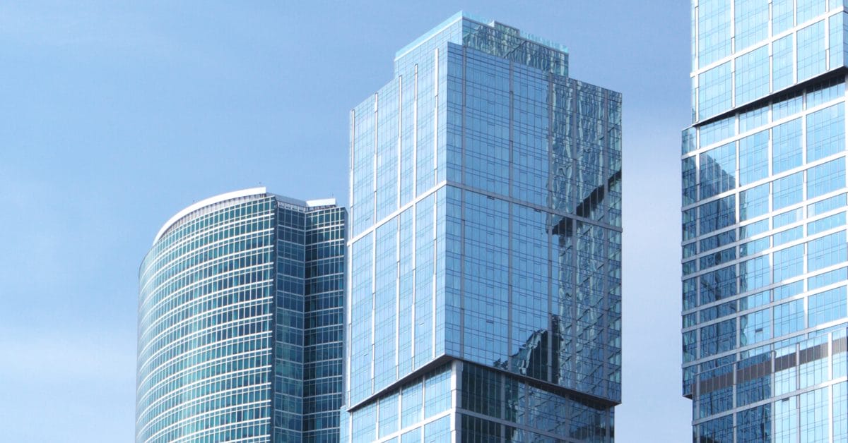 blue sky and blue commercial buildings on the skyline