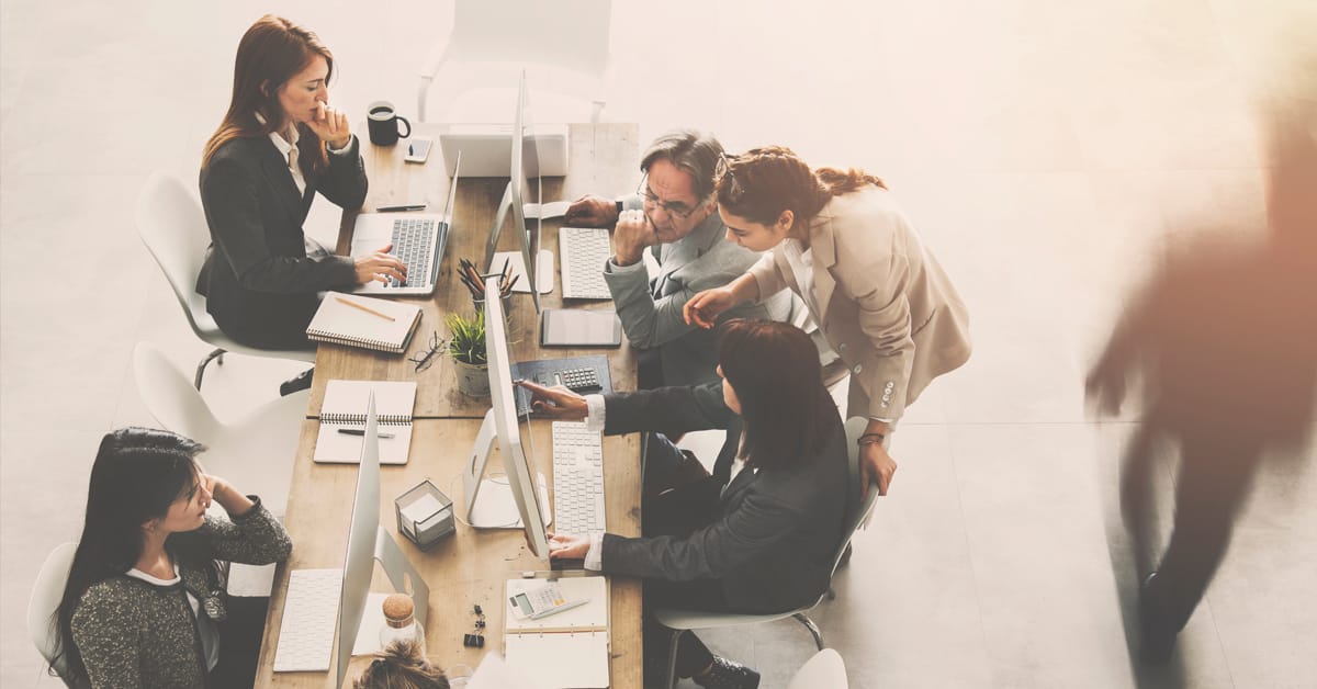 Employees working in an open office plan