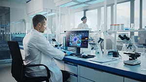 Advanced Medical Science Laboratory with Medical Scientist Working on Personal Computer