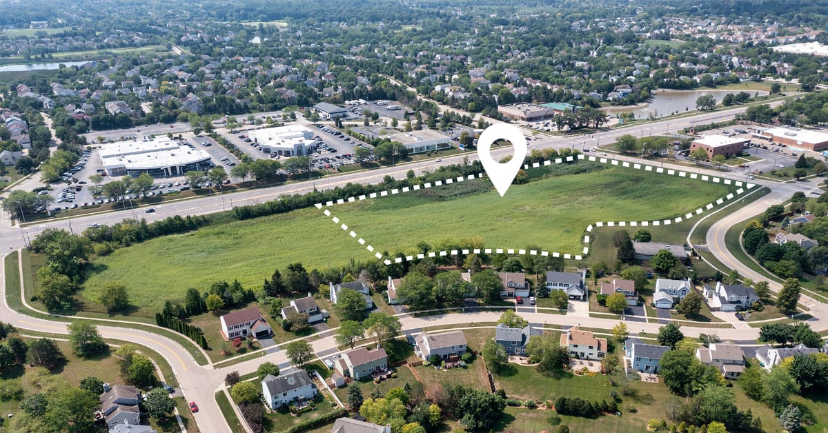 Aerial of neighborhood with outline of potential industrial development site