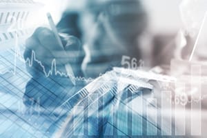 Business analysis, financial investment concept. Double exposure of businessman analyzing depreciation, economic trend, bank buildings and coins with financial graph for business finance background