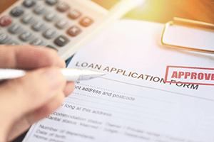 Loan Application with approval stamp