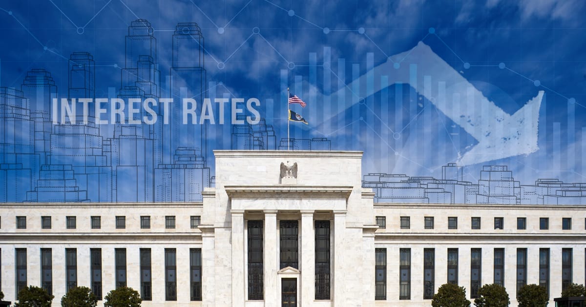Interest Rate reduction graph and city skyline overlay on Federal Reserve Building